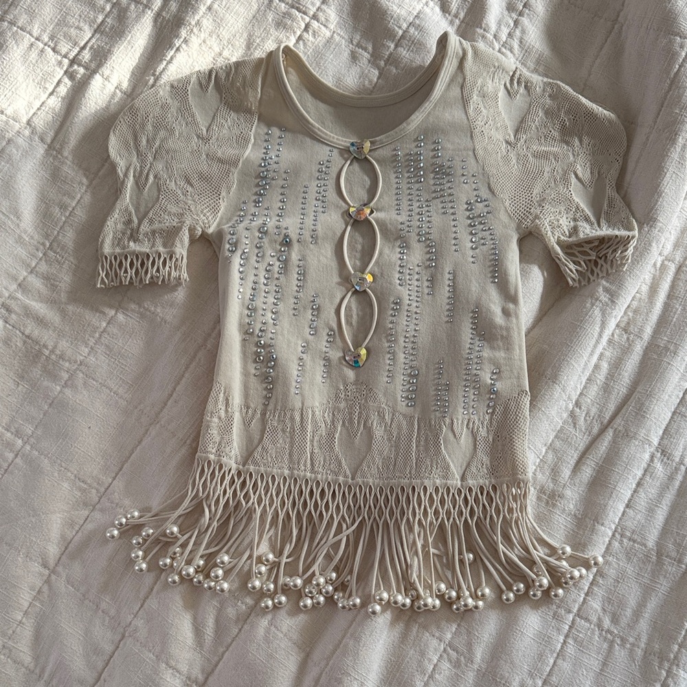 Urchin Top Shapewear Fringe Top in White
POSTER GIRL